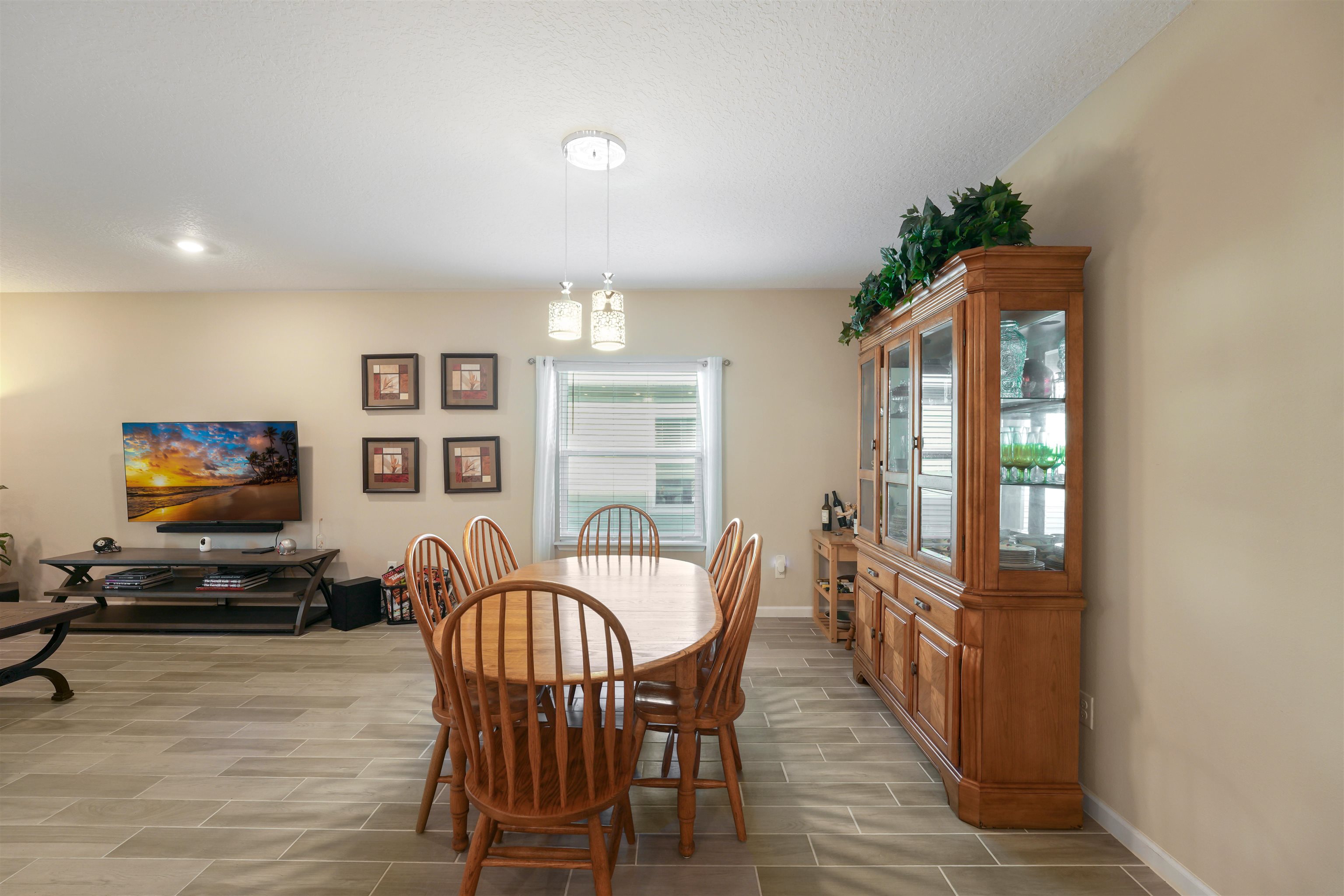 503 Stone Arbor Lane St. Augustine, FL 32086 - Photo 19 of 44 a view of a dining room with furniture window and wooden floor
