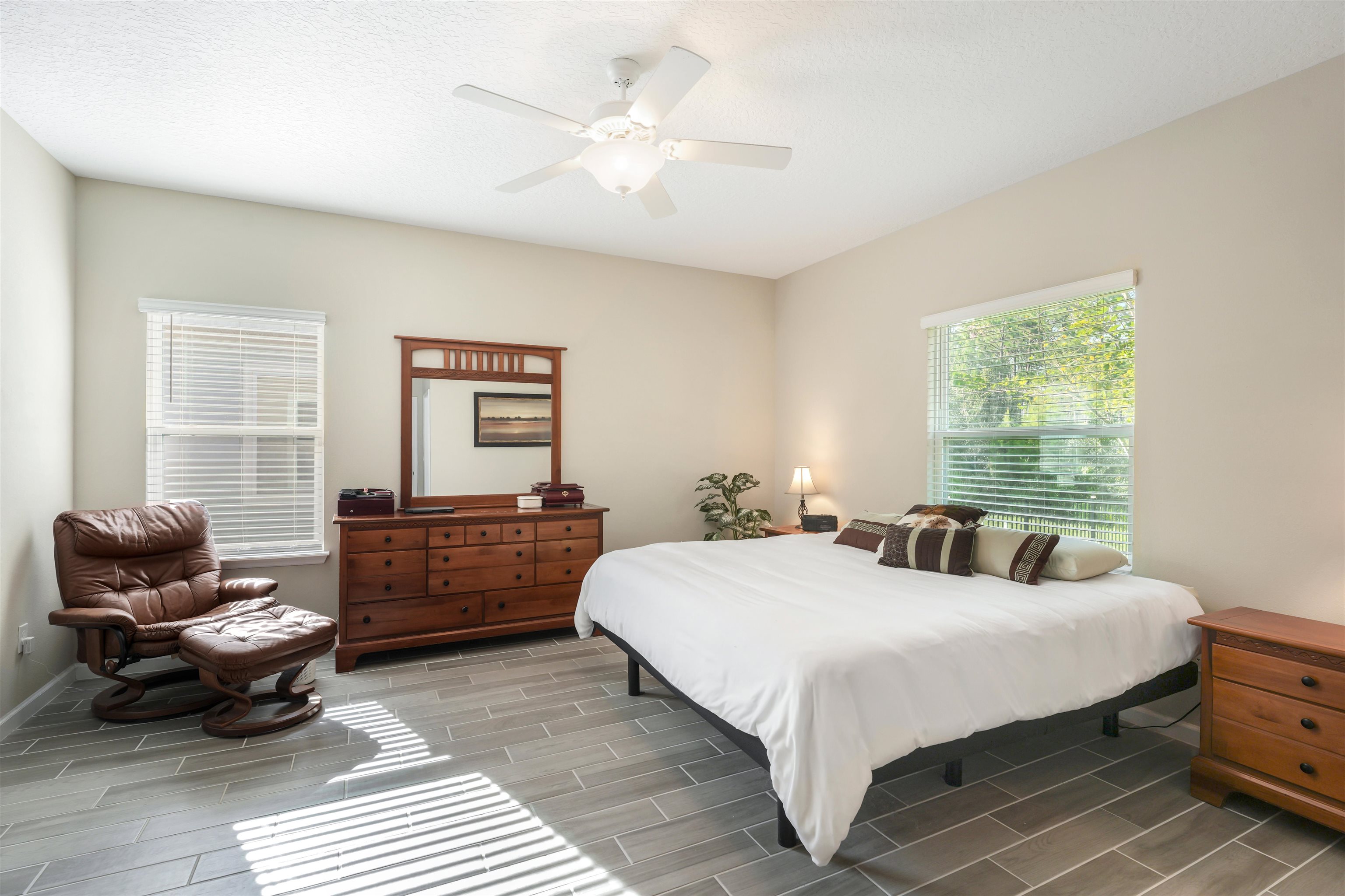 503 Stone Arbor Lane St. Augustine, FL 32086 - Photo 22 of 44 a bedroom with a bed and wooden floor