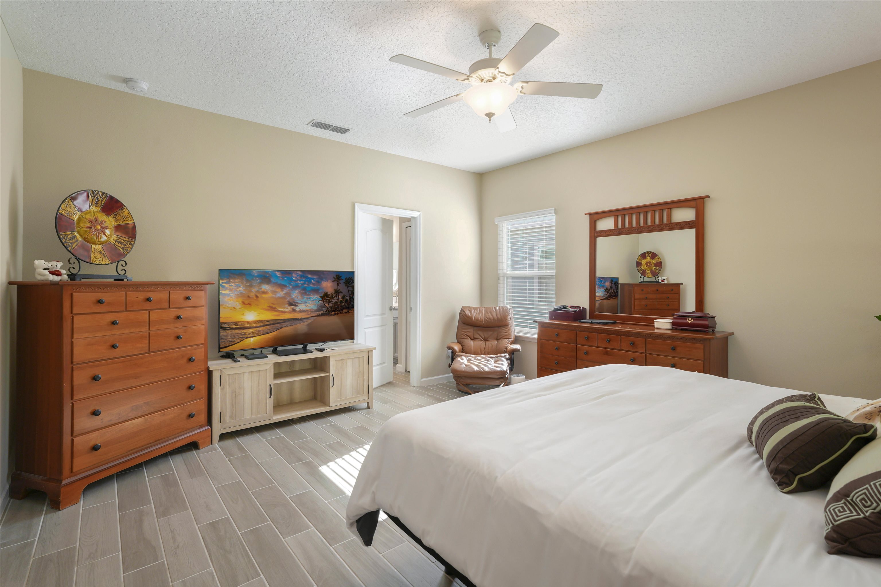 503 Stone Arbor Lane St. Augustine, FL 32086 - Photo 24 of 44 a bedroom with a bed and a television