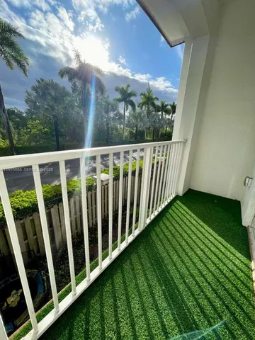 a view of a wooden fence