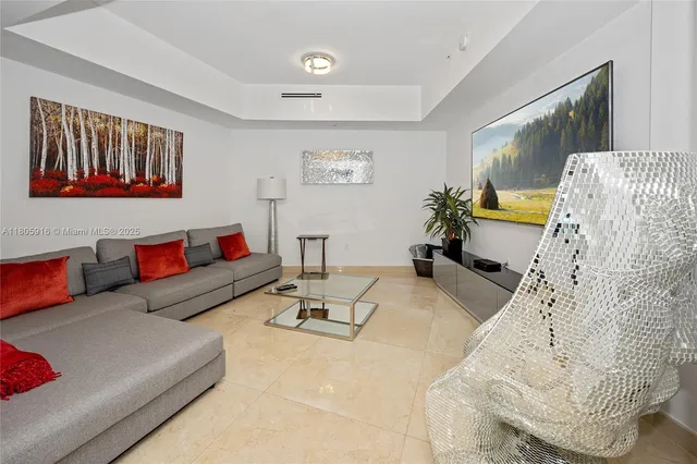 a living room with furniture and a couch