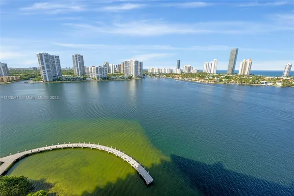a view of a city with an ocean view