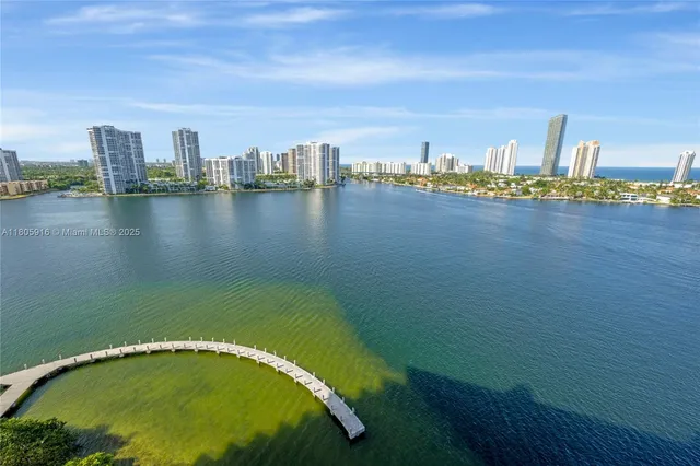 a view of a city with an ocean view