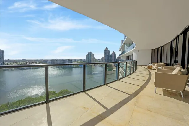 a view of balcony with furniture