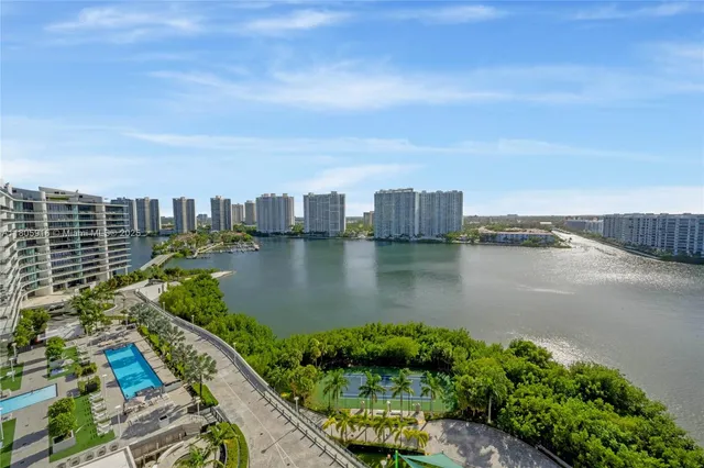 a view of a lake with a city