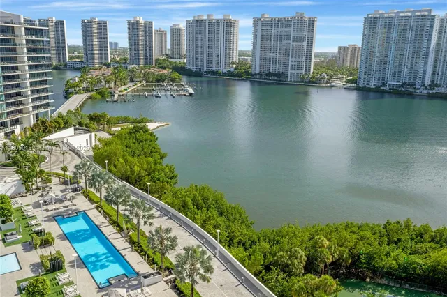 an aerial view of river residential house with outdoor space and lake