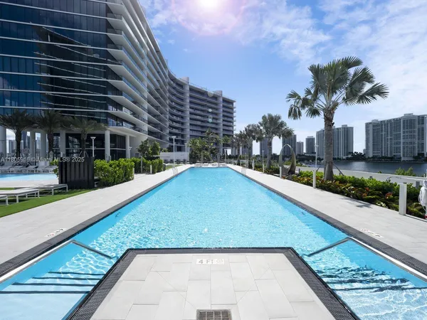 a view of swimming pool with a patio