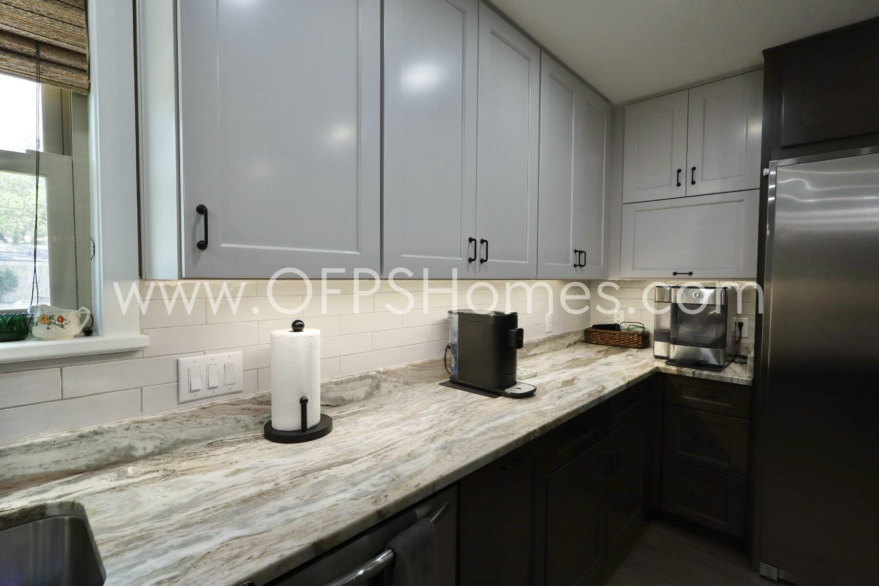 724 Overbrook Drive Fort Walton Beach, FL 32547 - Photo 14 of 47 a kitchen with a sink and cabinets