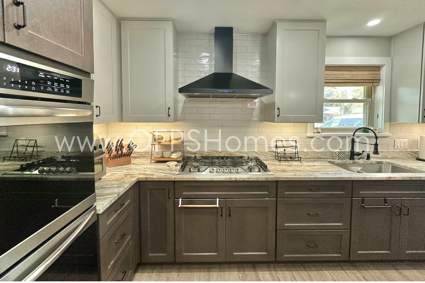 724 Overbrook Drive Fort Walton Beach, FL 32547 - Photo 19 of 47 a kitchen with a sink and cabinets