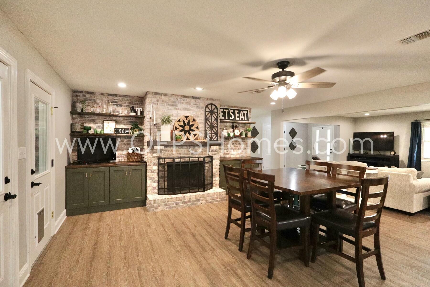 724 Overbrook Drive Fort Walton Beach, FL 32547 - Photo 20 of 47 a view of a dining room with furniture and wooden floor