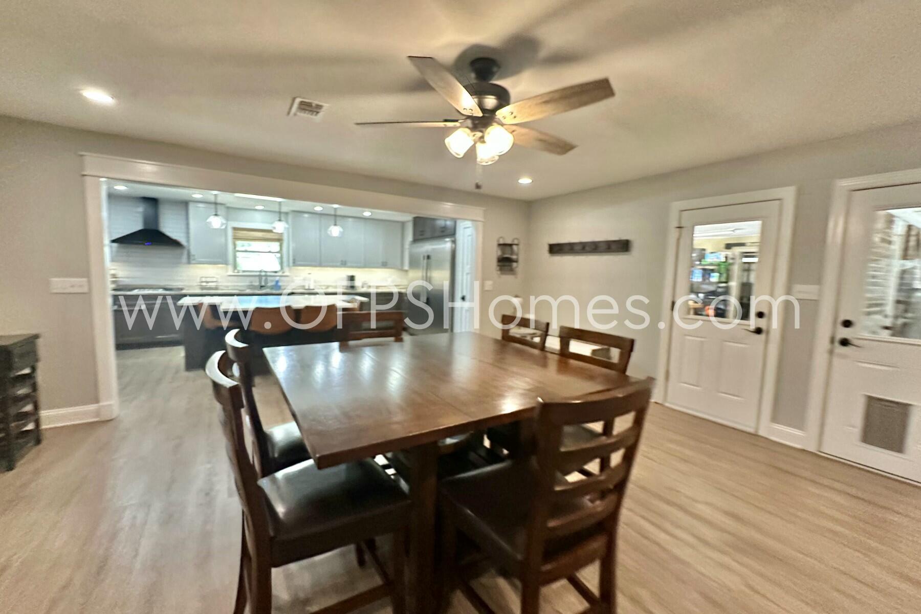 724 Overbrook Drive Fort Walton Beach, FL 32547 - Photo 22 of 47 a view of a dining room with furniture and wooden floor