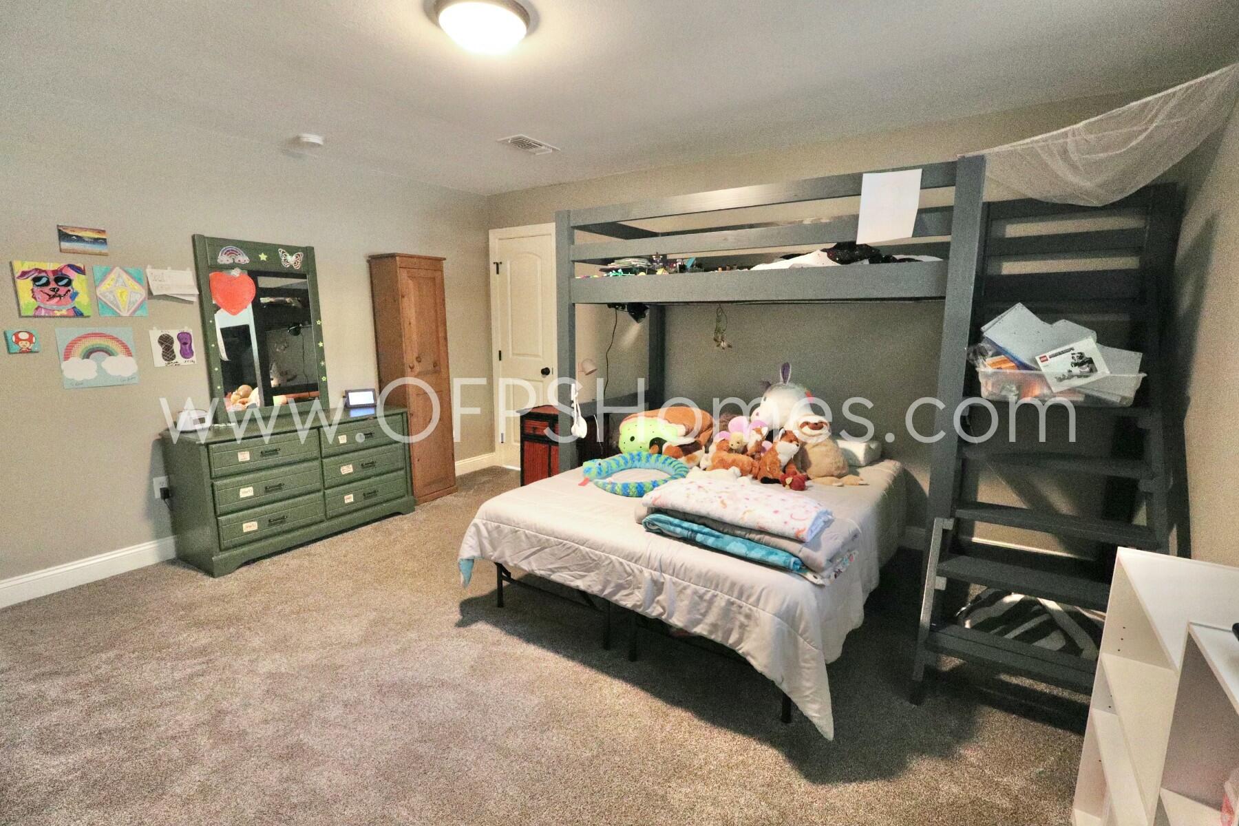 724 Overbrook Drive Fort Walton Beach, FL 32547 - Photo 28 of 47 a bedroom with a bed and a baby crib