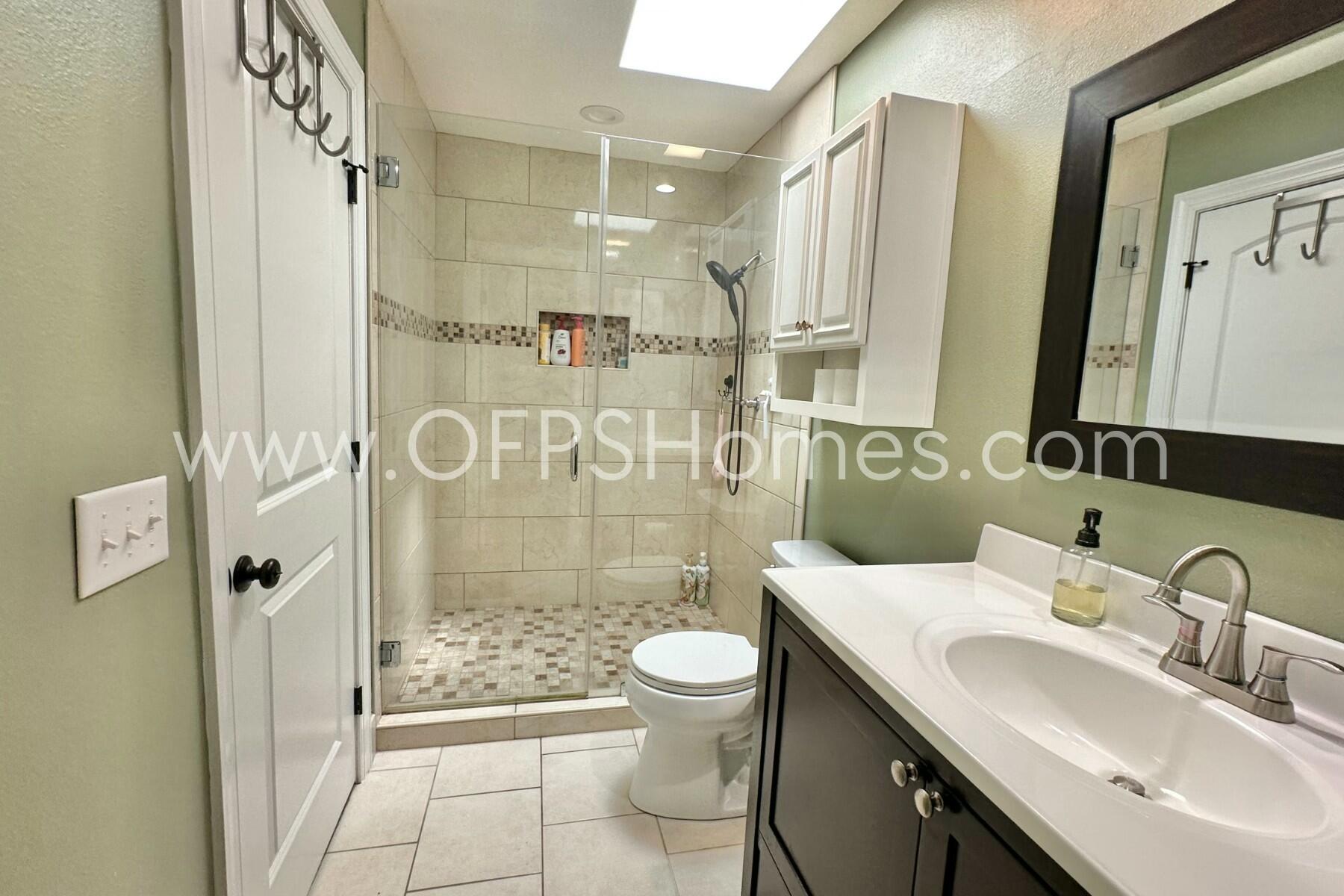 724 Overbrook Drive Fort Walton Beach, FL 32547 - Photo 30 of 47 a bathroom with a sink a toilet and shower