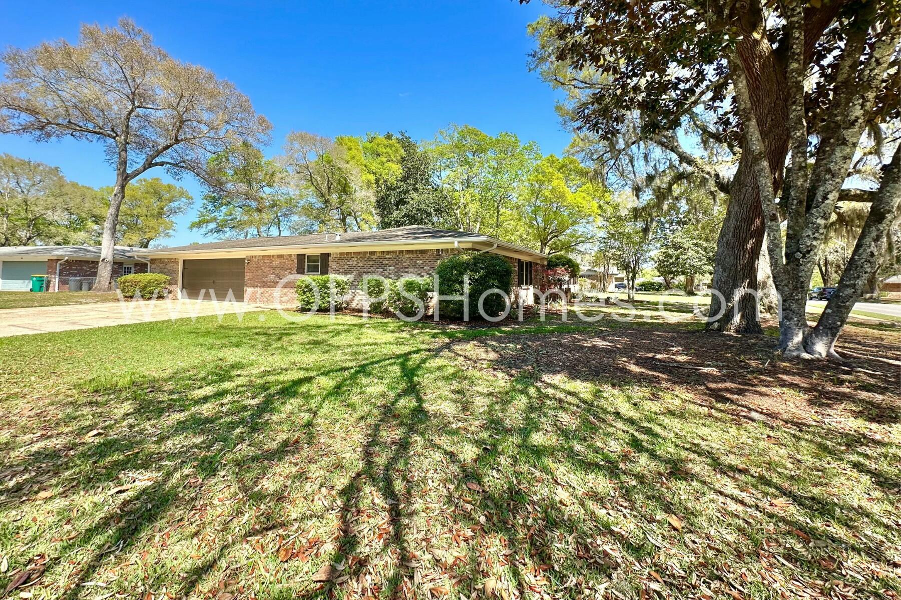724 Overbrook Drive Fort Walton Beach, FL 32547 - Photo 3 of 47 a view of a house with a yard
