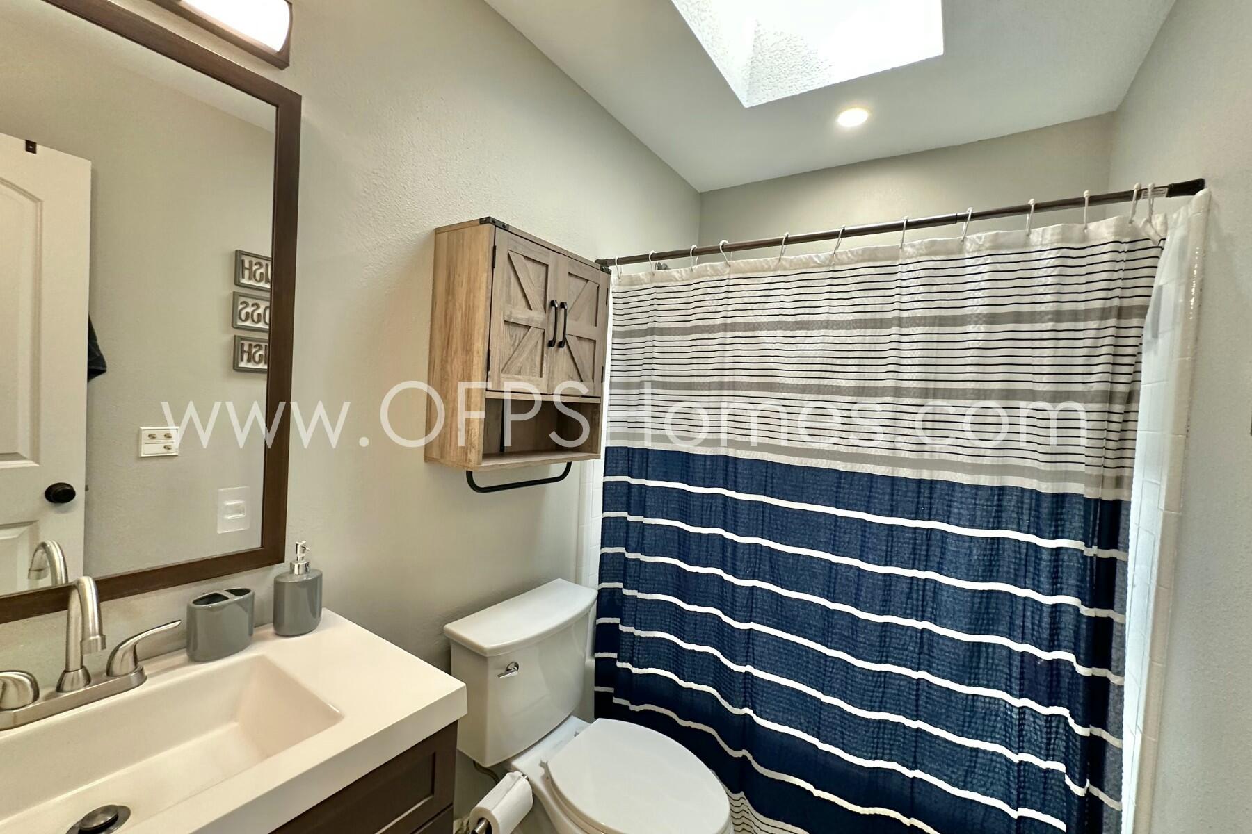 724 Overbrook Drive Fort Walton Beach, FL 32547 - Photo 35 of 47 a bathroom with a sink a toilet and shower