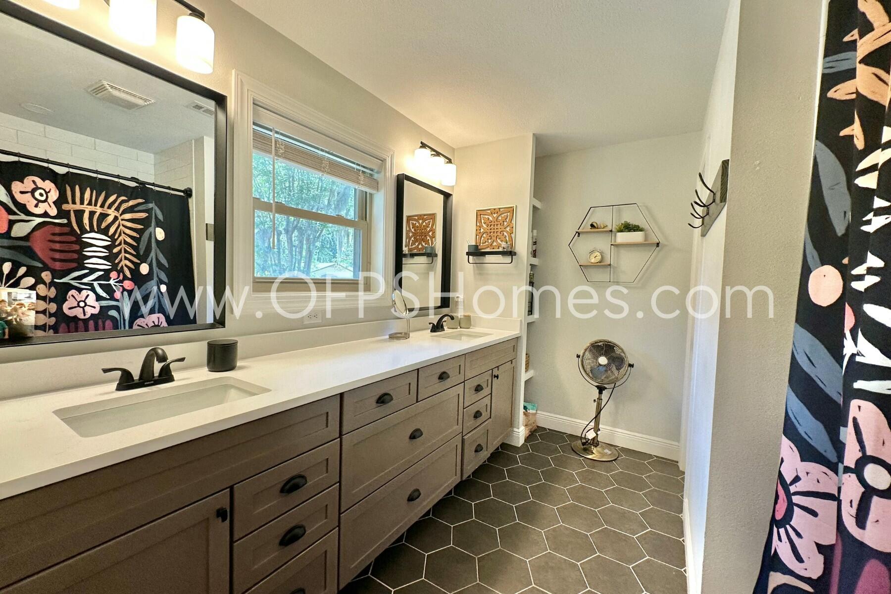 724 Overbrook Drive Fort Walton Beach, FL 32547 - Photo 39 of 47 a bathroom with a double vanity sink mirror and shower