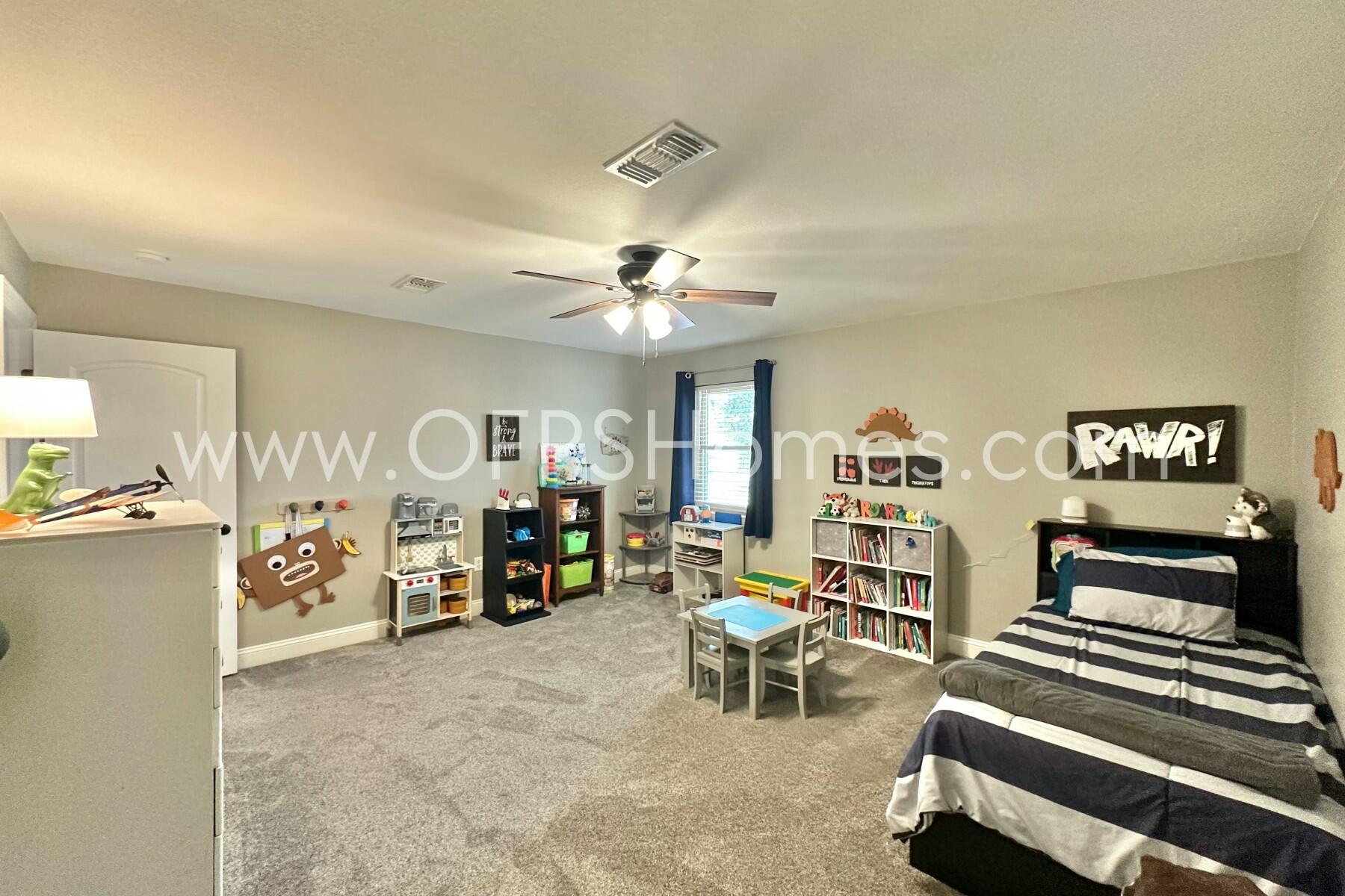 724 Overbrook Drive Fort Walton Beach, FL 32547 - Photo 43 of 47 a view of a livingroom with furniture and a flat screen tv