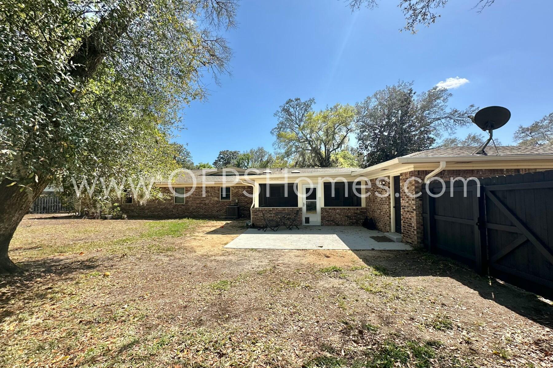 724 Overbrook Drive Fort Walton Beach, FL 32547 - Photo 45 of 47 a front view of a house with a yard