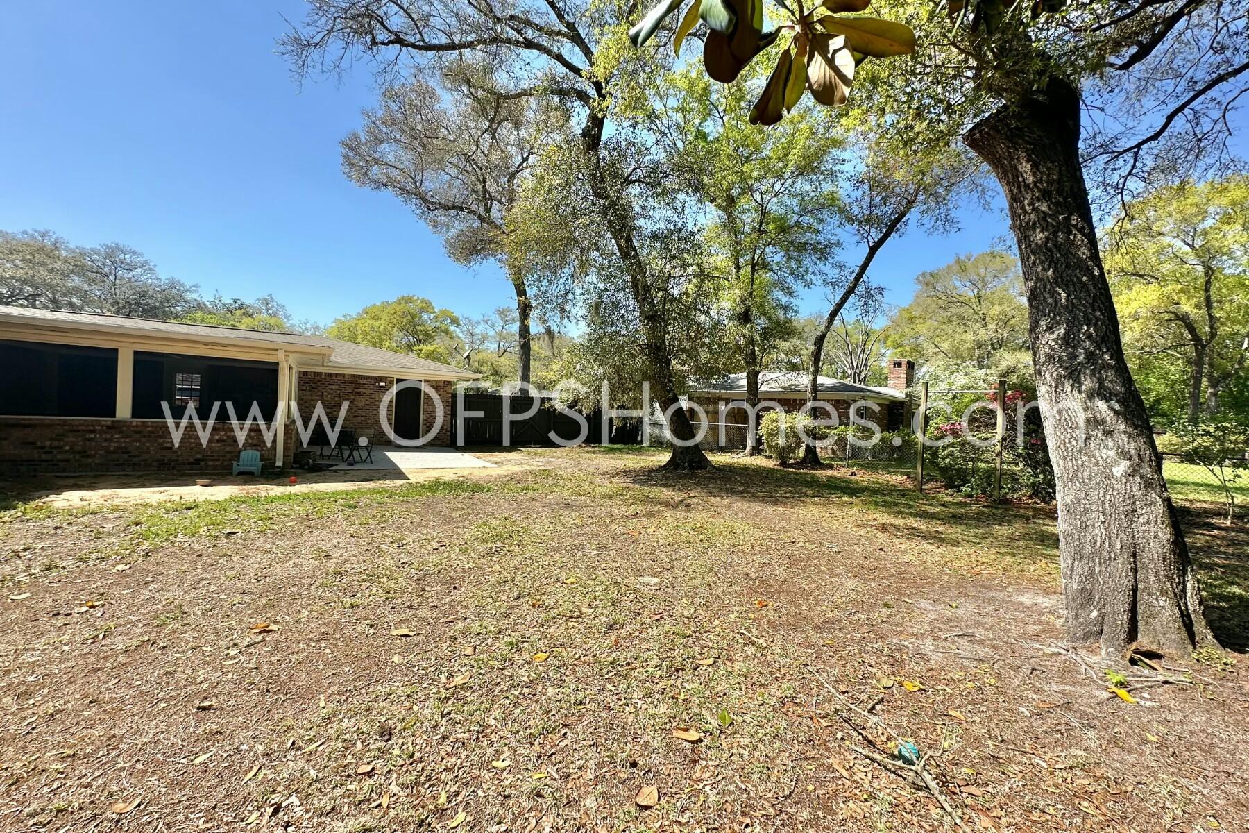 724 Overbrook Drive Fort Walton Beach, FL 32547 - Photo 47 of 47 a view of a house with a yard