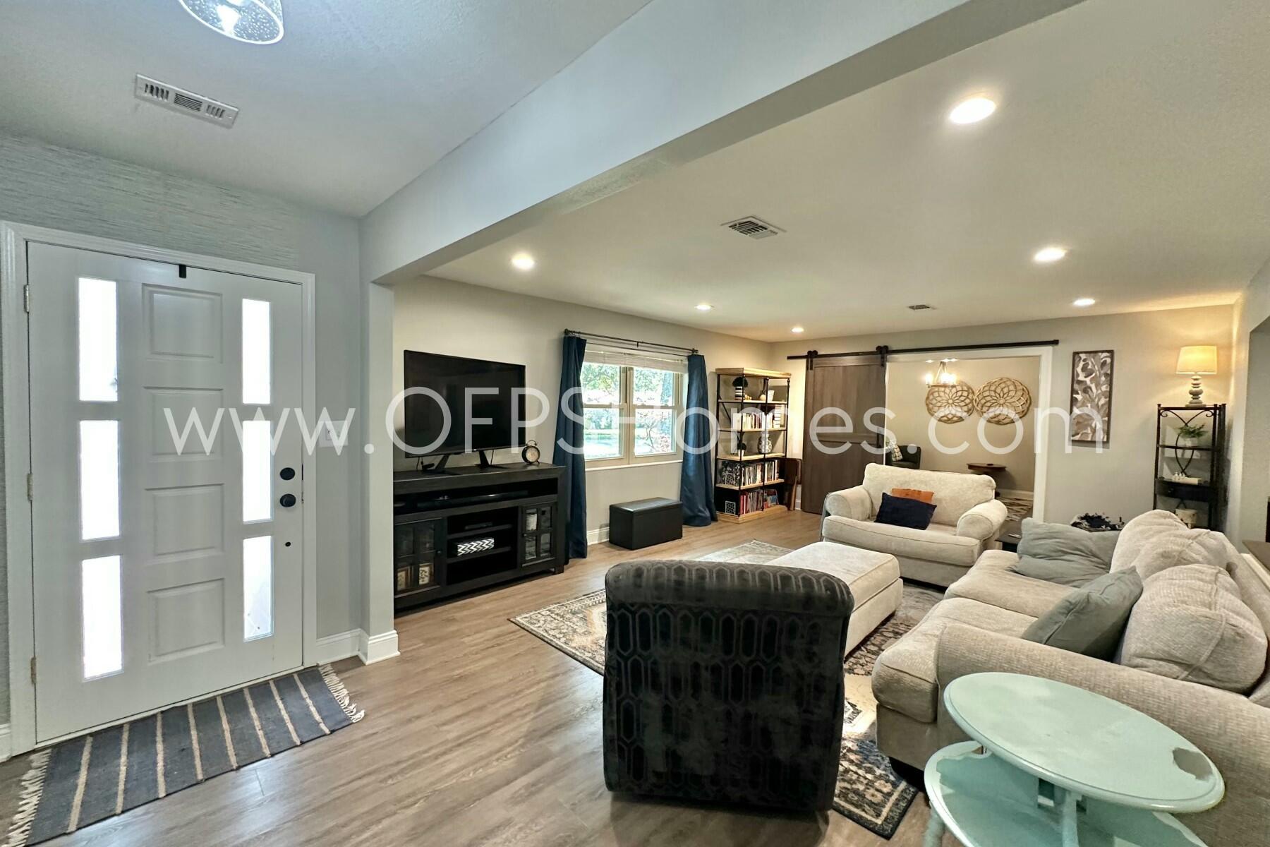 724 Overbrook Drive Fort Walton Beach, FL 32547 - Photo 6 of 47 a living room with furniture and wooden floor