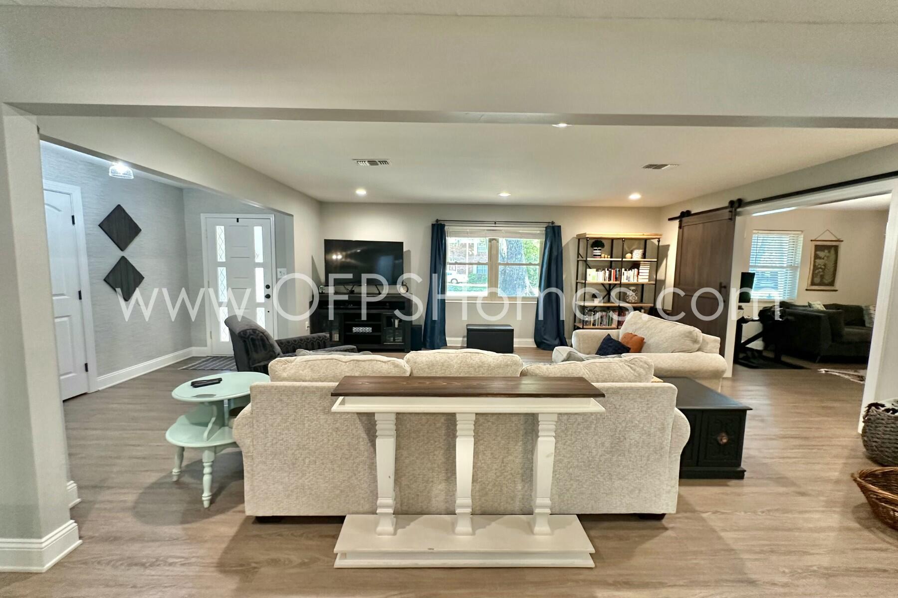 724 Overbrook Drive Fort Walton Beach, FL 32547 - Photo 10 of 47 a living room with fireplace furniture and a wooden floor