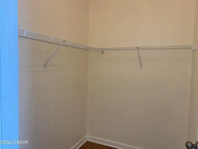 a view of a room with racks on the wall