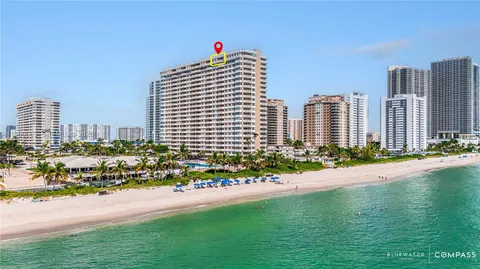 a front view of a city with tall buildings