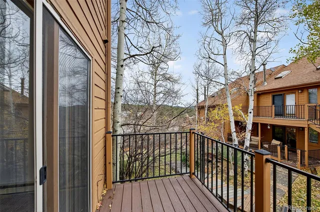 a view of a brick building from a balcony