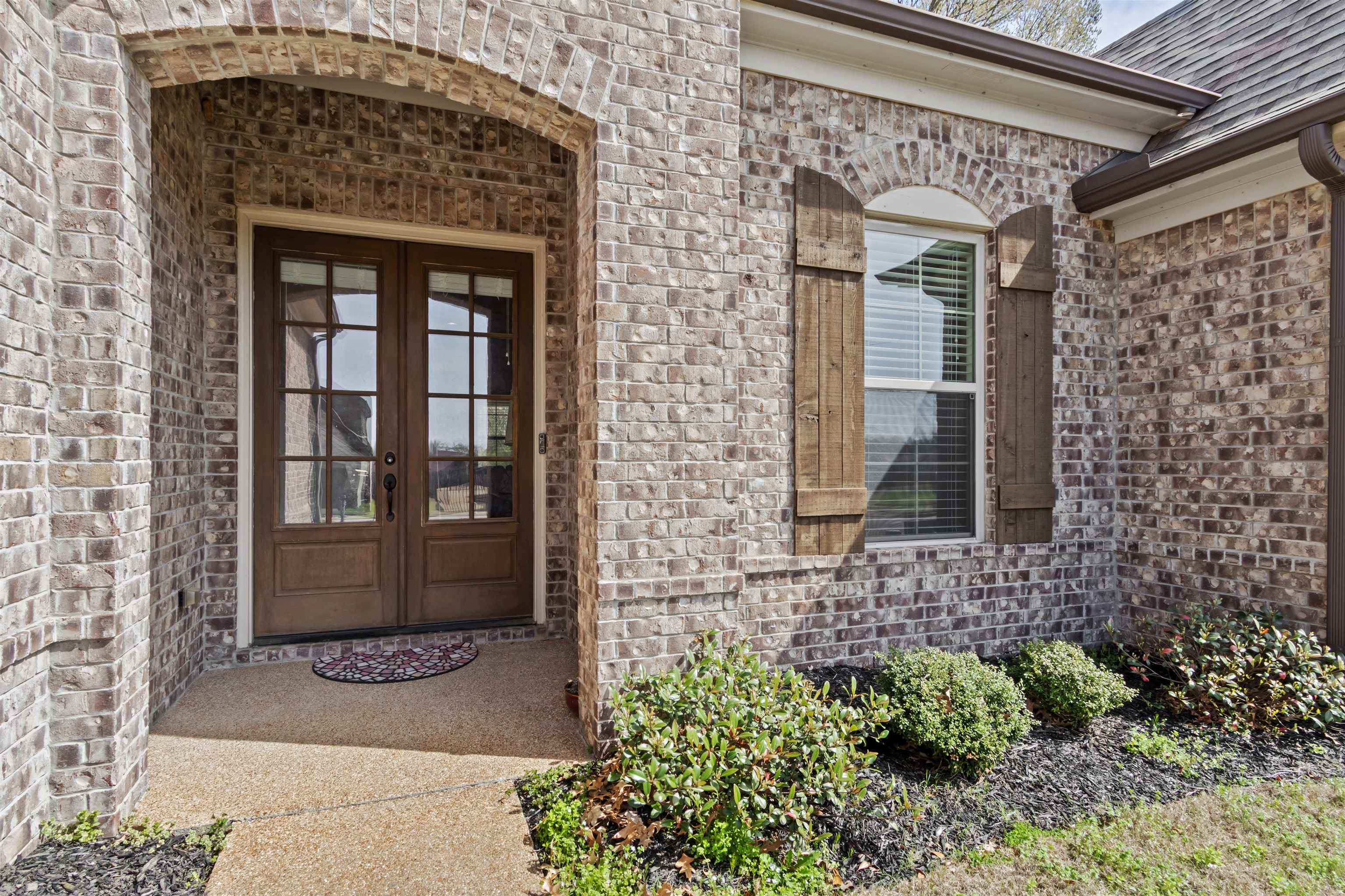 4996 Granite Creek Road Memphis, TN 38125 - Photo 3 of 37 a front view of a house