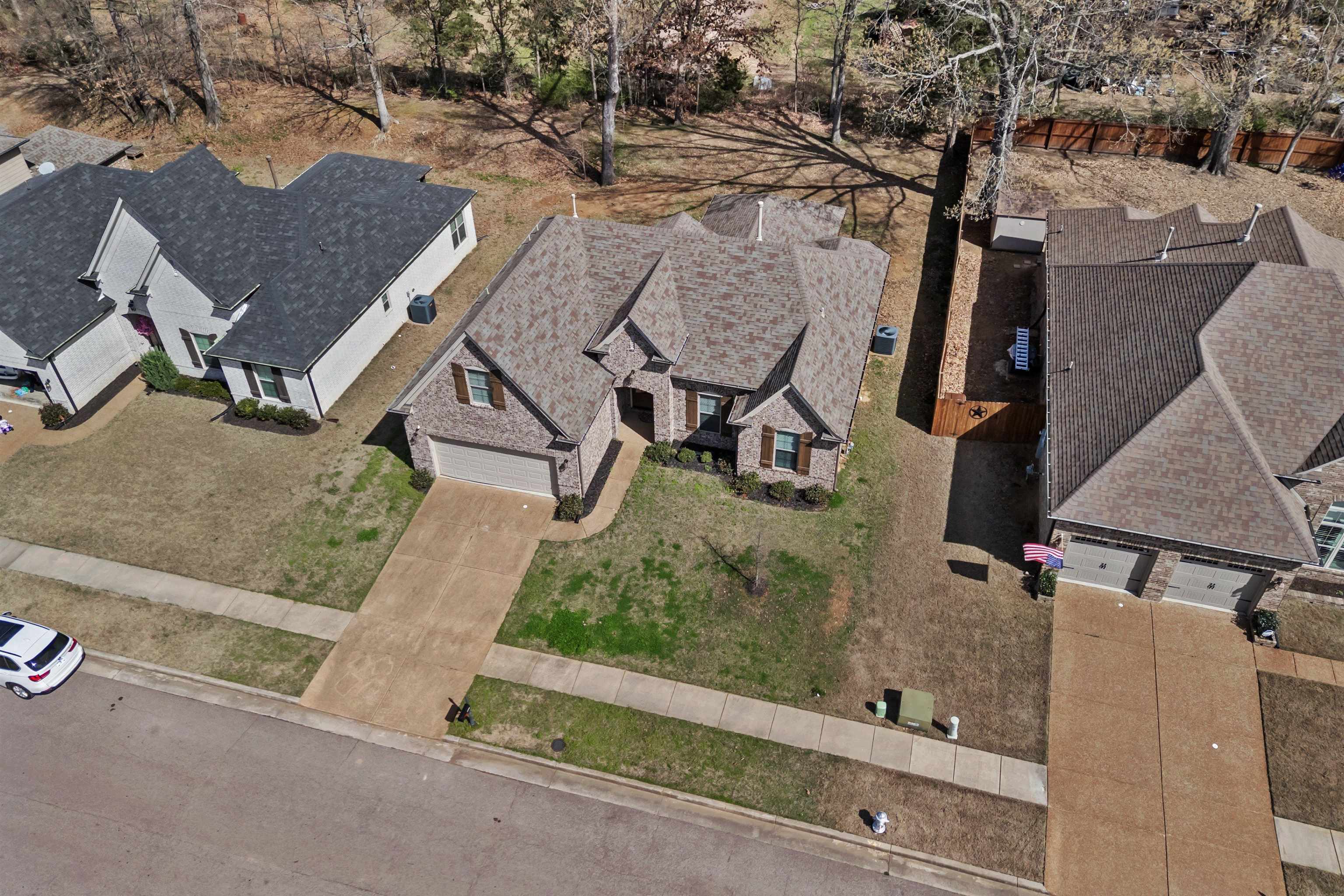 4996 Granite Creek Road Memphis, TN 38125 - Photo 32 of 37 an aerial view of residential houses with outdoor space