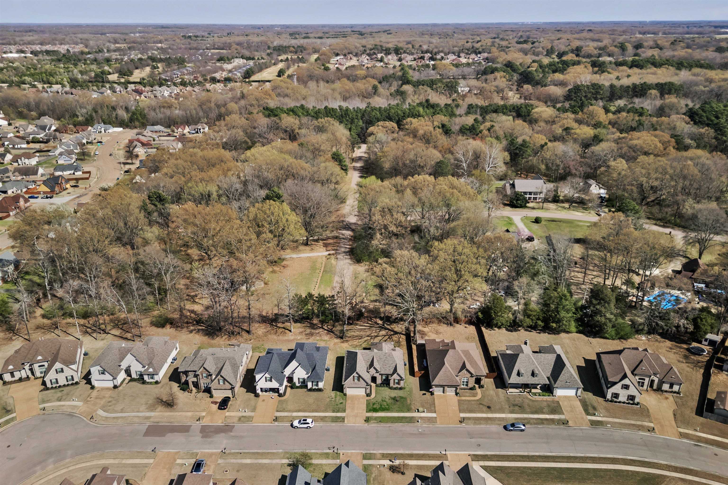 4996 Granite Creek Road Memphis, TN 38125 - Photo 35 of 37 an aerial view of houses with yard