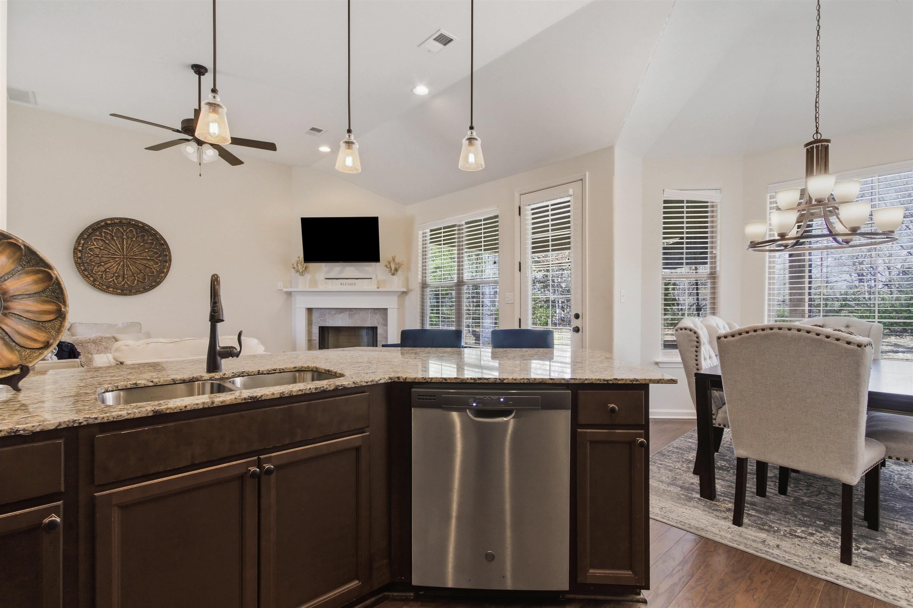 4996 Granite Creek Road Memphis, TN 38125 - Photo 10 of 37 a kitchen with a sink and a refrigerator