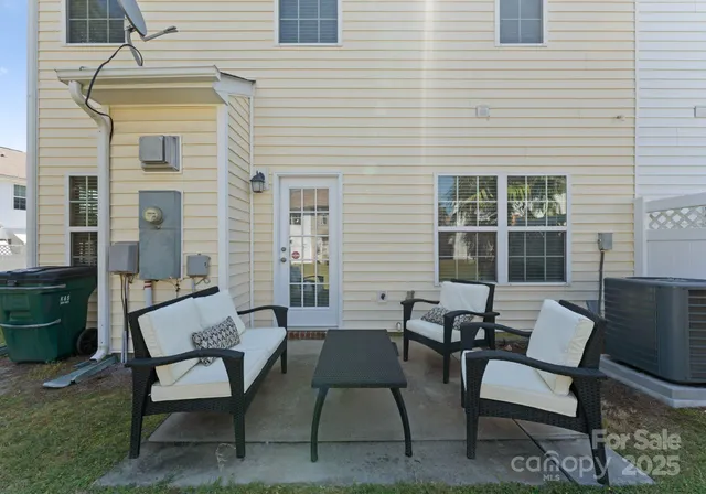 a building outdoor space with patio furniture