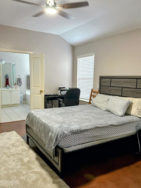 2224 Kerr Trail Cedar Park, TX 78613 - Photo 9 of 15 a bedroom with a bed and wooden floor