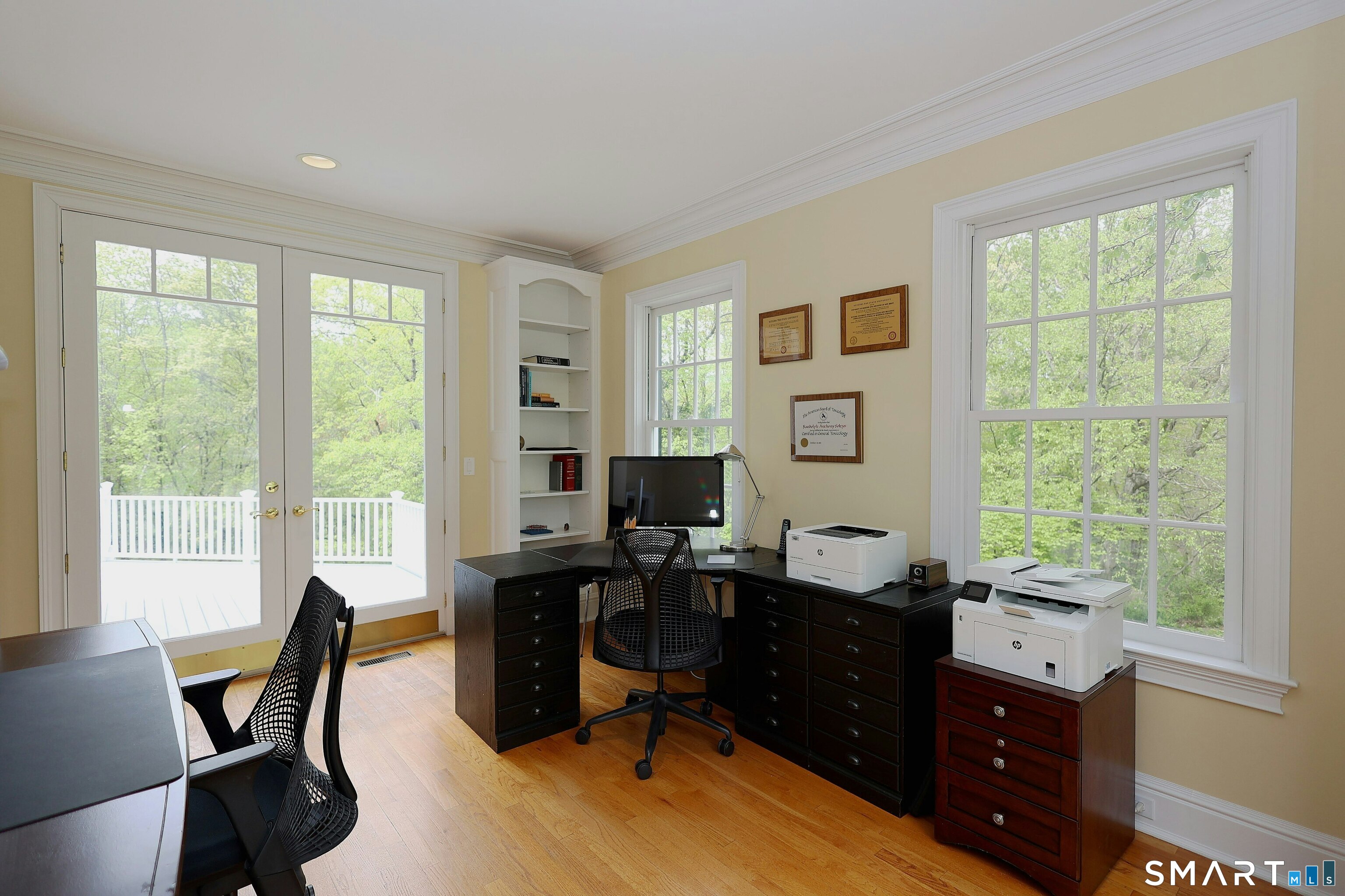 30 Whipstick Road Ridgefield, CT 06877 - Photo 14 of 40 a view of a workspace with furniture and a window