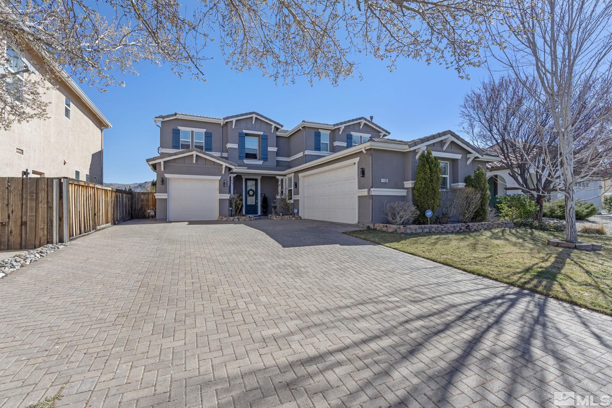 11300 Parma Court Reno, NV 89521 - Photo 2 of 40 a view of a house with a yard