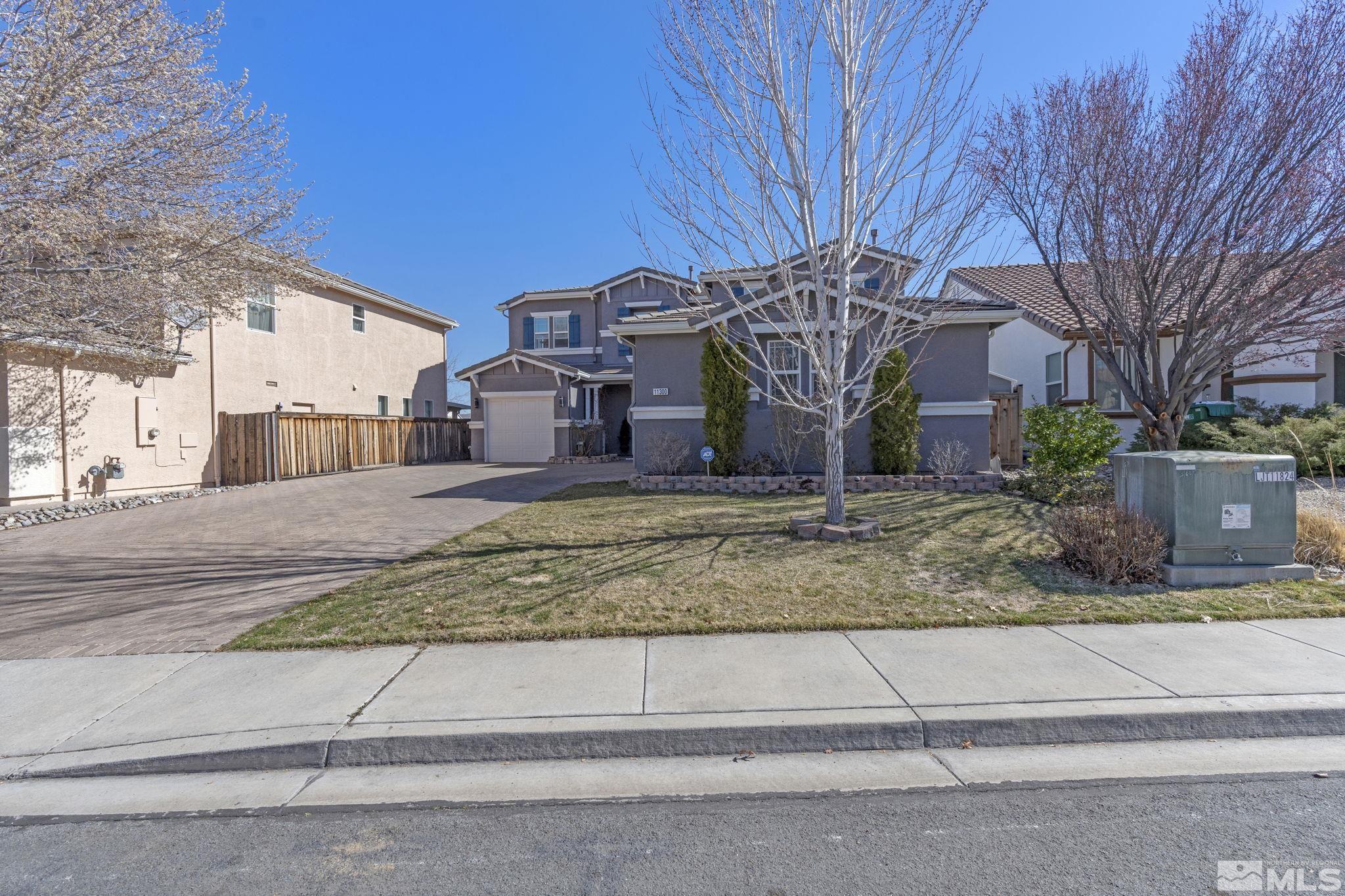 11300 Parma Court Reno, NV 89521 - Photo 3 of 40 a view of a house with a yard
