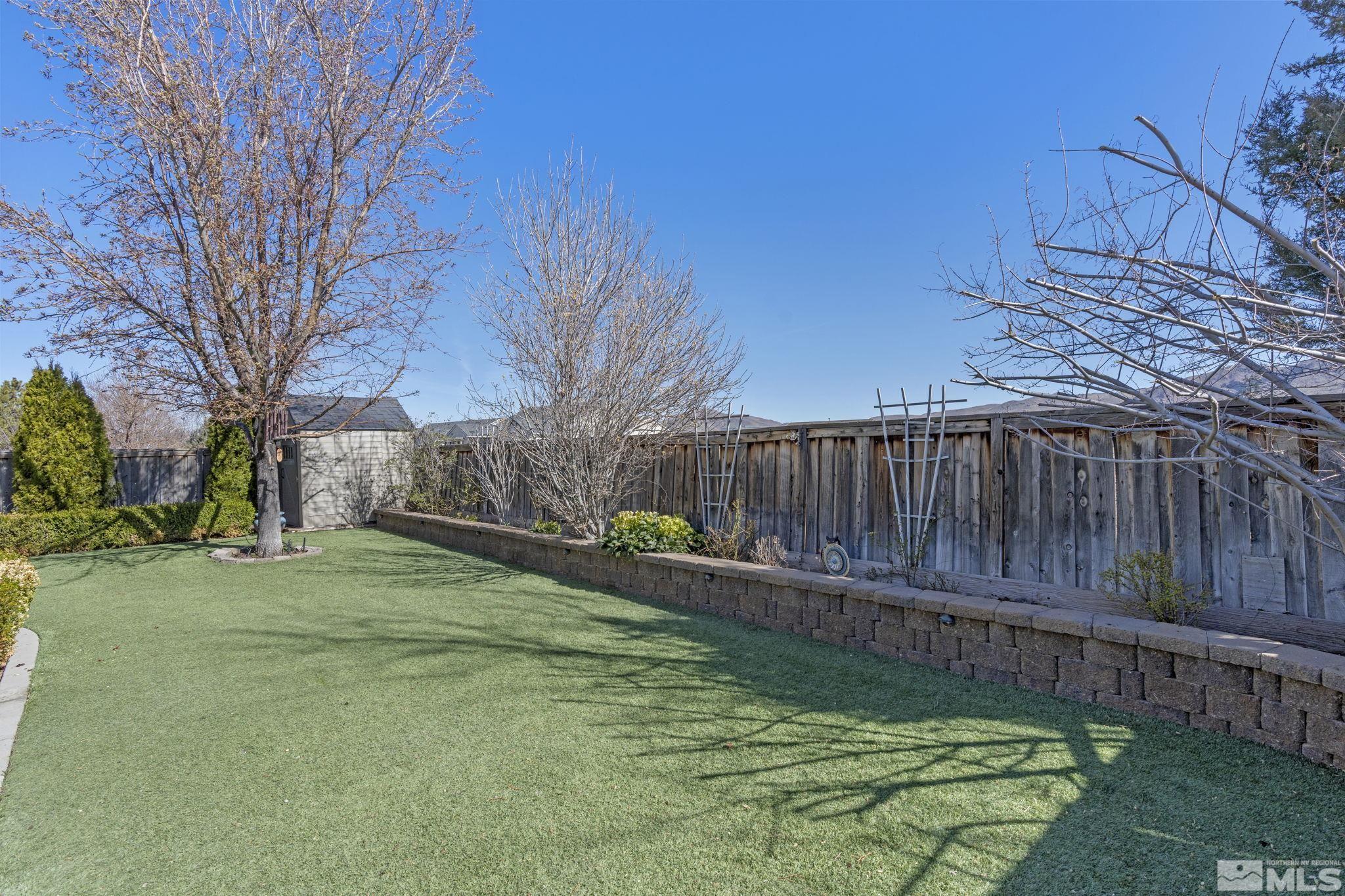 11300 Parma Court Reno, NV 89521 - Photo 40 of 40 a view of a backyard with wooden fence