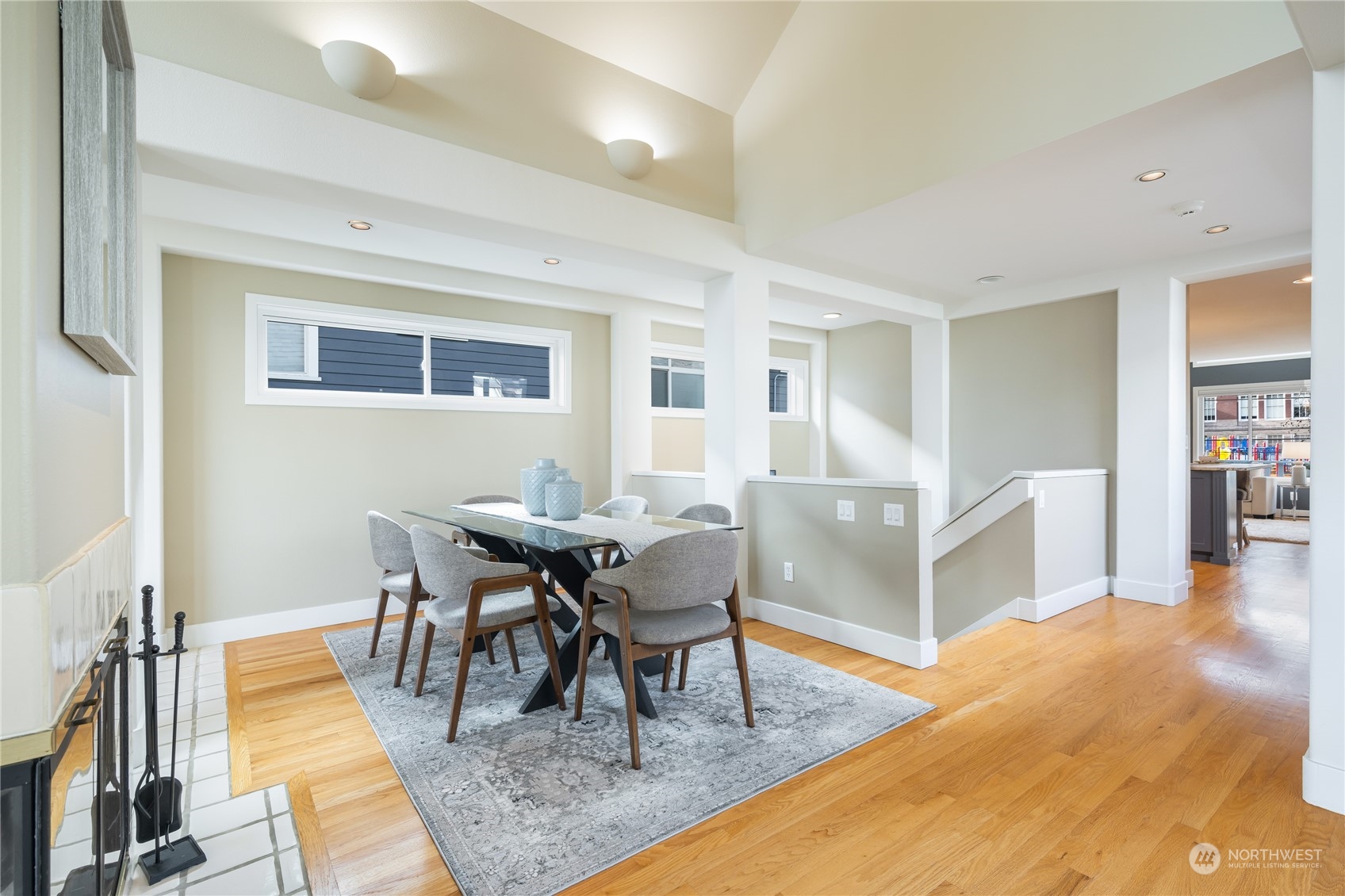 1624 38th Avenue East Seattle, WA 98112 - Photo 12 of 39 a view of a dining room with furniture and wooden floor