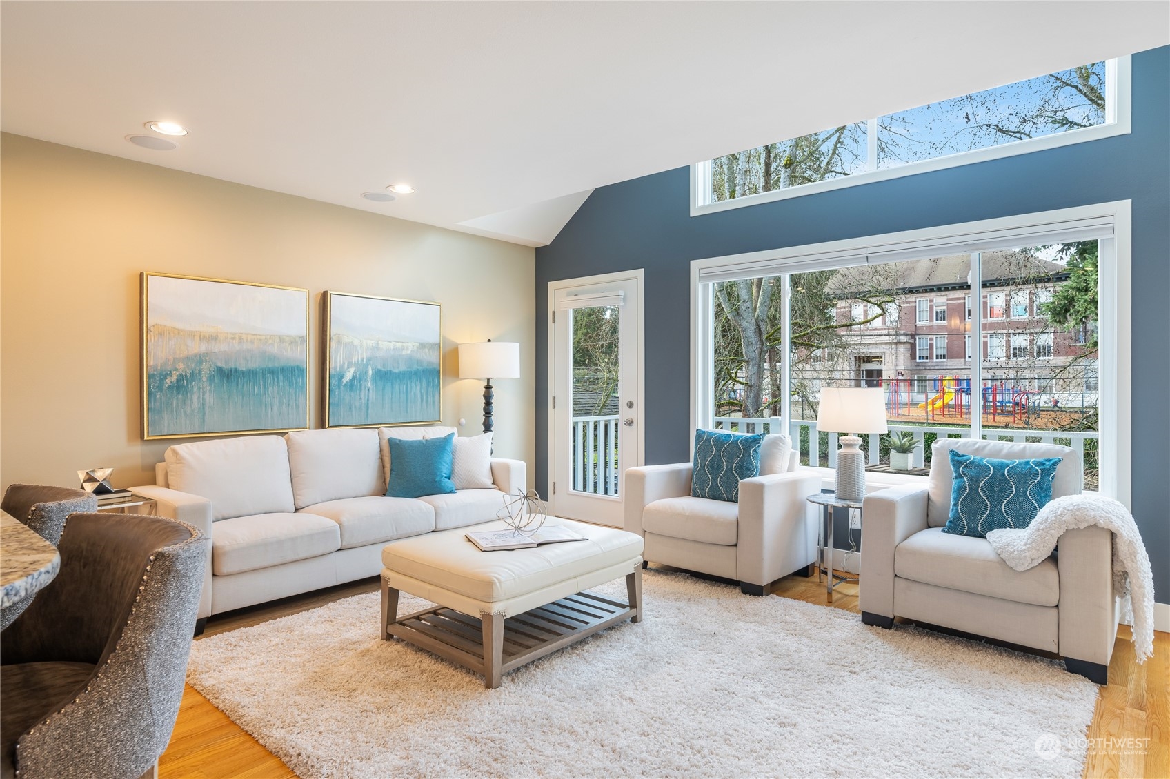 1624 38th Avenue East Seattle, WA 98112 - Photo 17 of 39 a living room with furniture and a large window