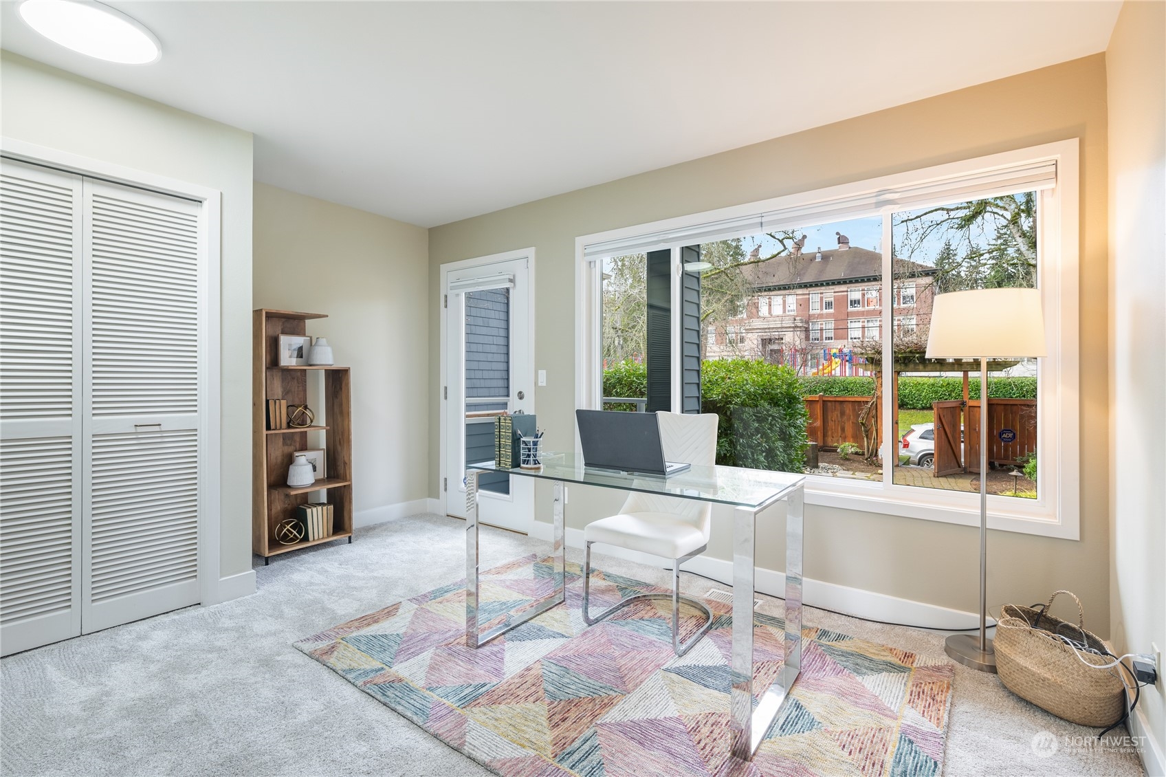 1624 38th Avenue East Seattle, WA 98112 - Photo 27 of 39 a living room with furniture and large windows
