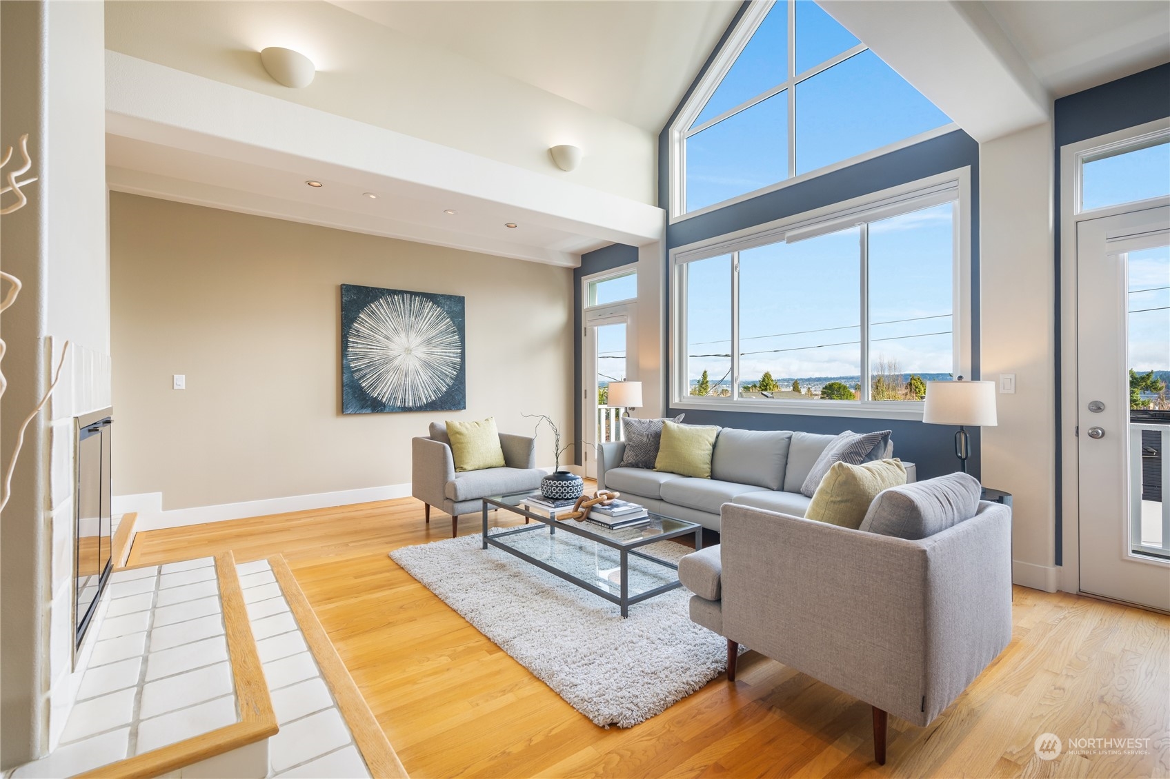 1624 38th Avenue East Seattle, WA 98112 - Photo 4 of 39 a living room with furniture and a rug