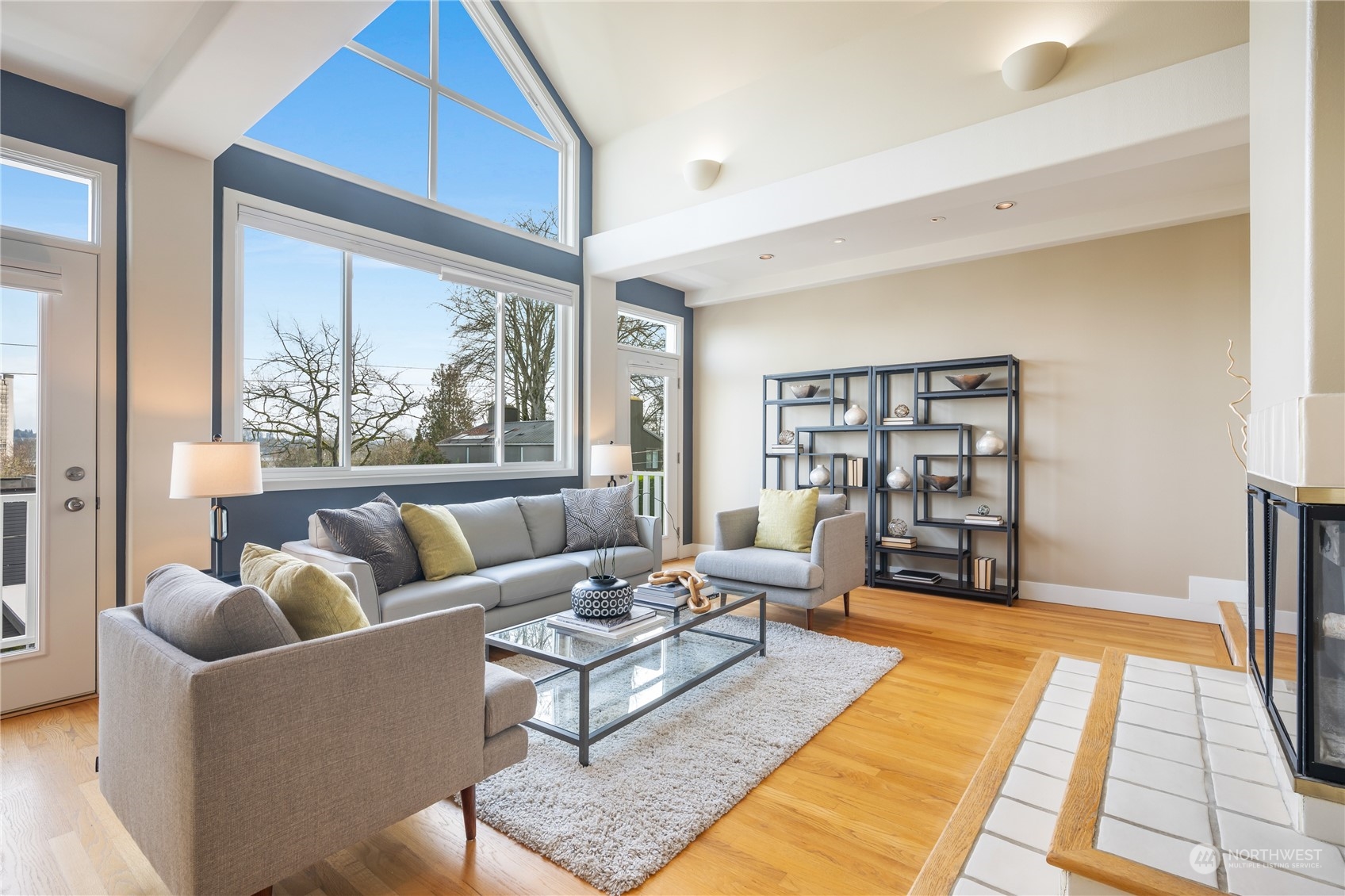 1624 38th Avenue East Seattle, WA 98112 - Photo 5 of 39 a living room with furniture wooden floor and a table