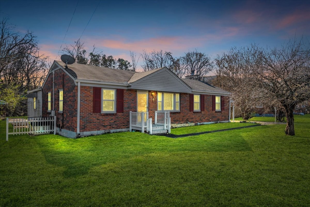 361 Tusculum Road Nashville, TN 37211 - Photo 1 of 42 a view of a house with a yard and sitting area