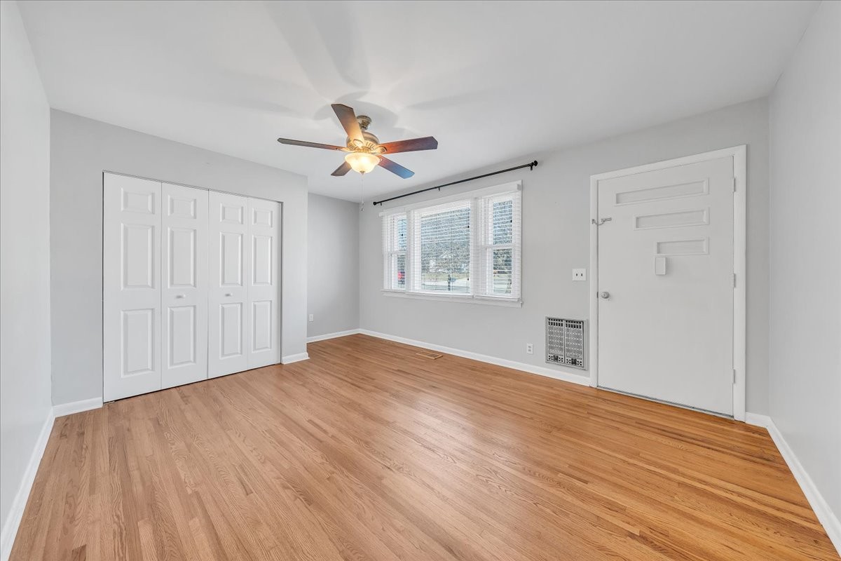 361 Tusculum Road Nashville, TN 37211 - Photo 14 of 42 a view of empty room with wooden floor and fan