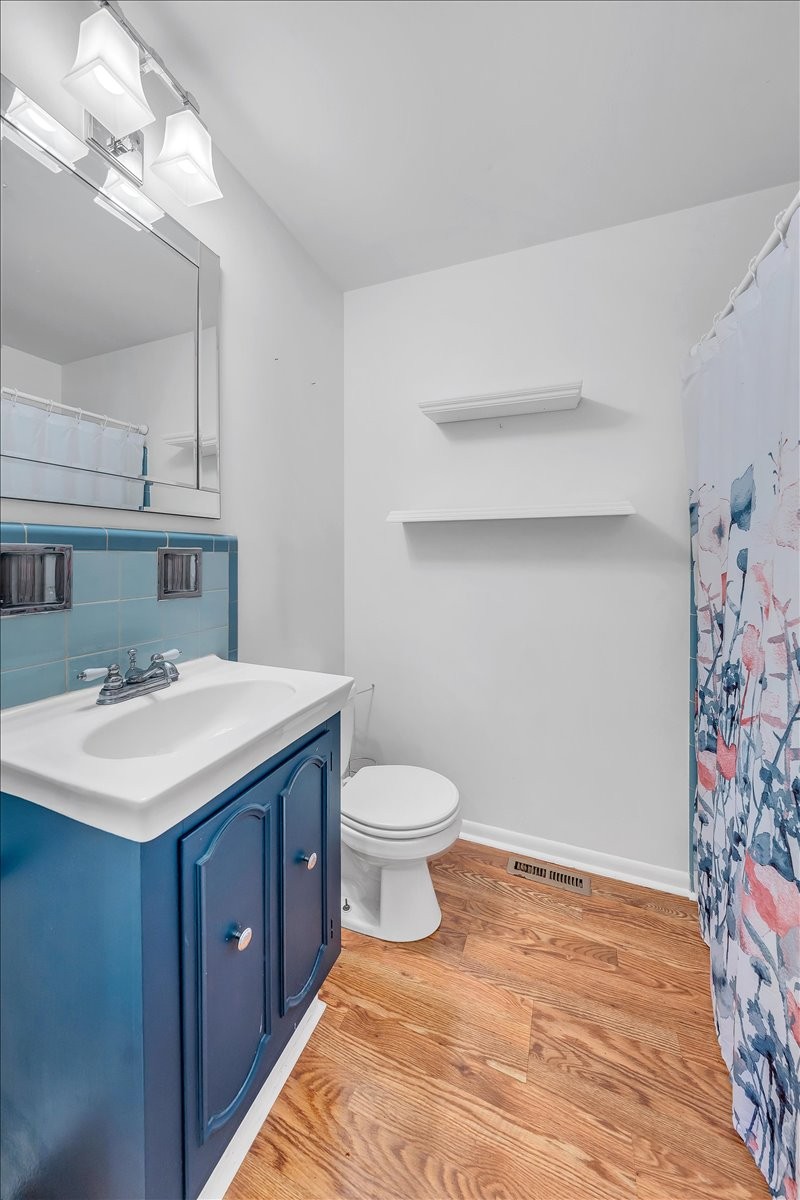 361 Tusculum Road Nashville, TN 37211 - Photo 22 of 42 a bathroom with a sink a toilet and shower