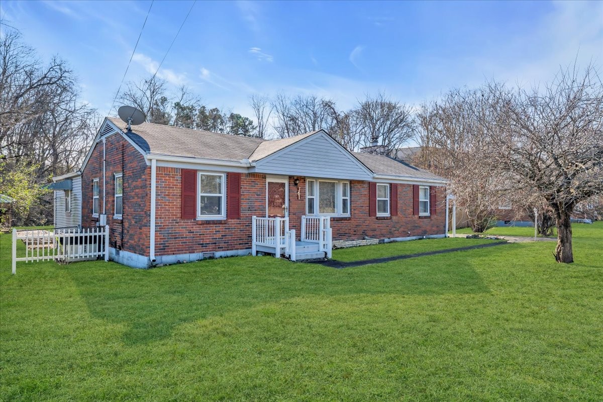 361 Tusculum Road Nashville, TN 37211 - Photo 23 of 42 a view of a house with a yard and sitting area
