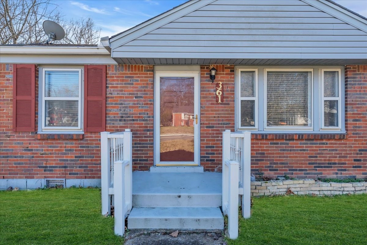 361 Tusculum Road Nashville, TN 37211 - Photo 24 of 42 a front view of a house with a garden