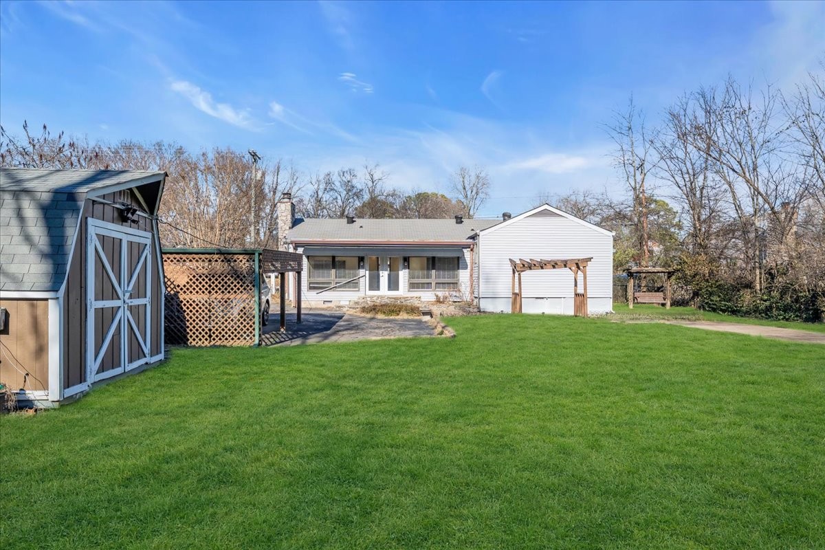 361 Tusculum Road Nashville, TN 37211 - Photo 34 of 42 a view of a house with backyard and porch
