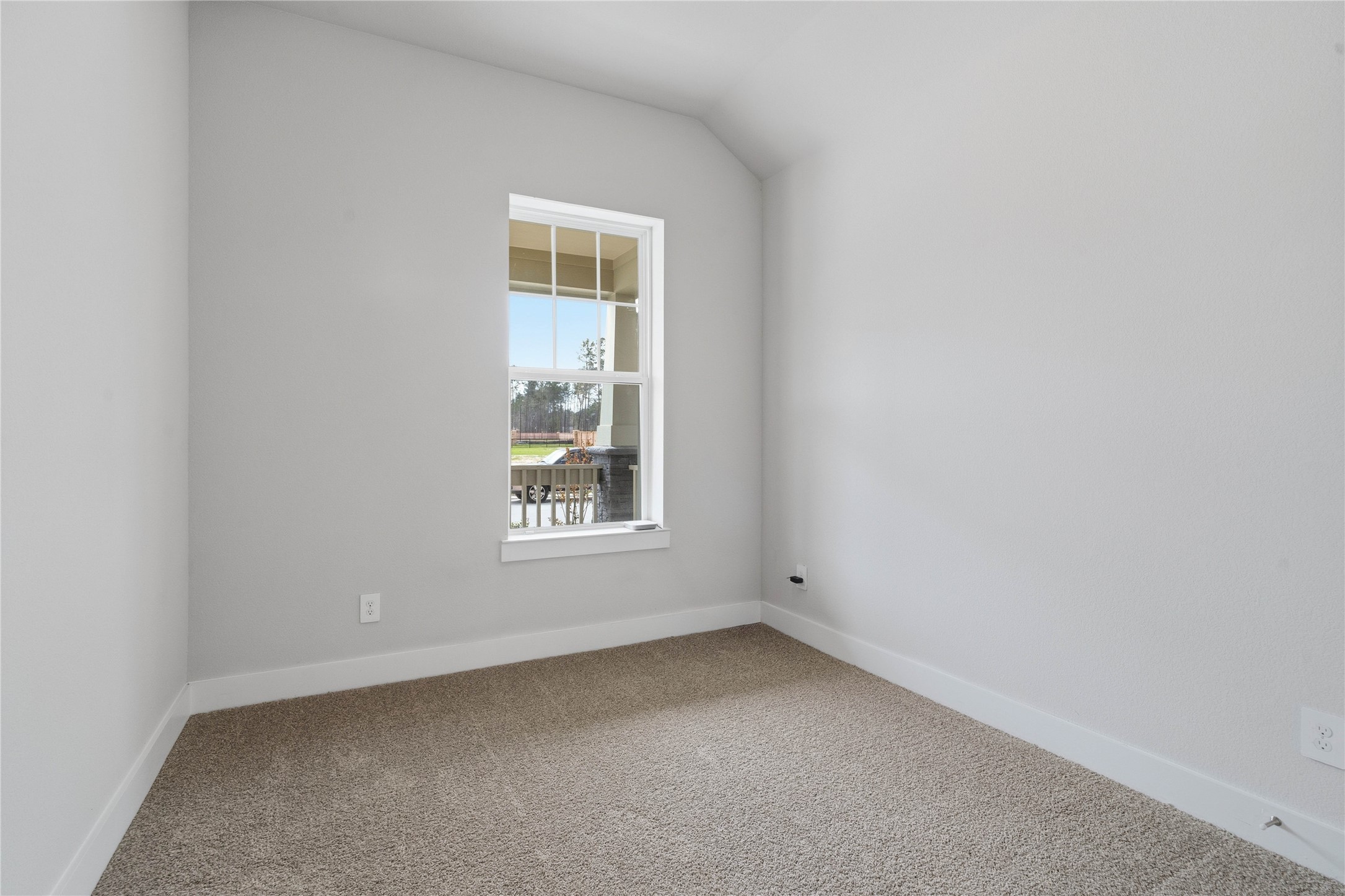 9123 Petroglyph Pt Court Porter, TX 77365 - Photo 9 of 43 an empty room with a window